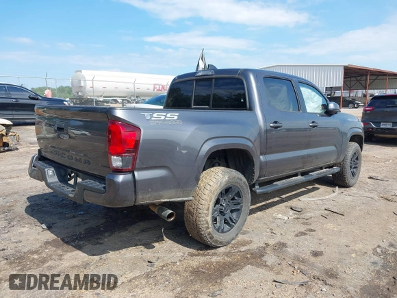 2022 Toyota Tacoma SR z VIN 3TYAX5GN5NT046897, wystawiony jako IAAI lot #42253604 z przebiegiem 69 246 mil mil oraz . Historia ofert i sprzedaży dostępna na DreamBid. Obrazek 4.