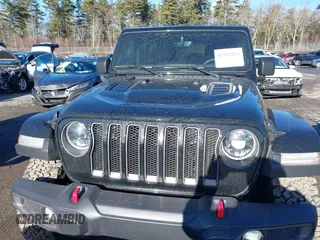 2023 Jeep Wrangler Rubicon with VIN 1C4JJXFGXPW682231, listed as a IAAI auction lot 41110264 with 15,147 mi miles and . Bid and sale history available at DreamBid. Image 12.