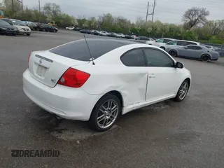 2007 Scion tC Spec with VIN JTKDE177270146530, listed as a IAAI auction lot 42033365 with 128,482 mi miles. Bid and sale history available at carsss.com. Image 4.