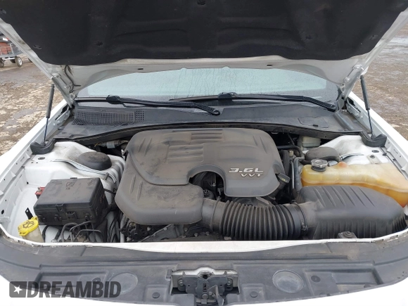 2014 Chrysler 300 with VIN 2C3CCAAG2EH235495, listed as a IAAI auction lot 41787801 with 142,354 mi miles and . Bid and sale history available at DreamBid. Image 10.