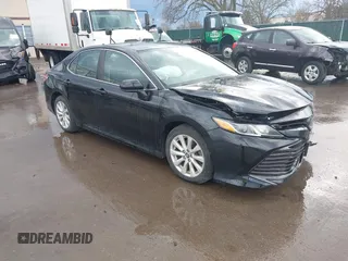 2019 Toyota Camry LE with VIN 4T1B11HK2KU263910, listed as a IAAI auction lot 42060008 with 31,433 mi miles and . Bid and sale history available at DreamBid. Image 1.