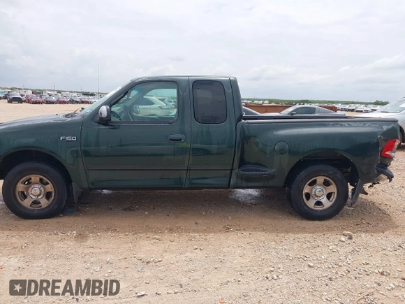 2001 Ford F-150 XL with VIN 1FTZX07271KB88709, listed as a IAAI auction lot 42599181 with 153,985 mi miles and . Bid and sale history available at DreamBid. Image 14.