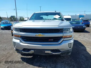 2018 Chevrolet Silverado 1500 LT with VIN 1GCVKREC8JZ237565, listed as a IAAI auction lot 42052619 with 92,790 mi miles and . Bid and sale history available at DreamBid. Image 12.