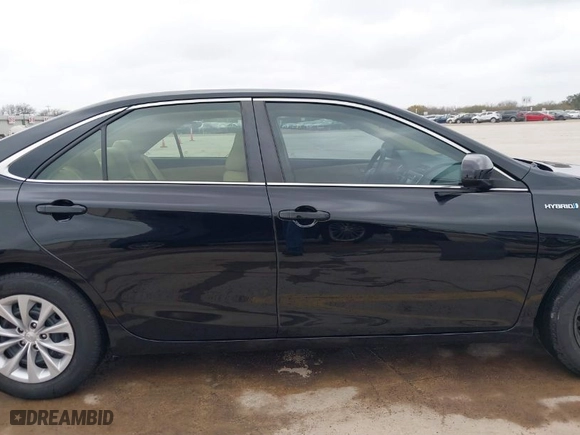 2015 Toyota Camry Hybrid LE with VIN 4T1BD1FK0FU148612, listed as a IAAI auction lot 41710518 with 126,248 mi miles. Bid and sale history available at carsss.com. Image 14.