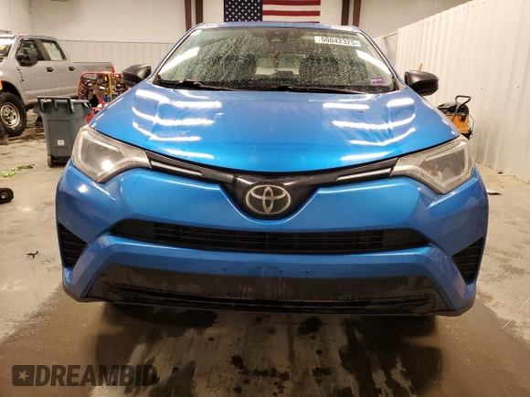 2018 Toyota RAV4 LE with VIN JTMBFREV9JJ197097, listed as a Copart auction lot 50042325 with 167,978 mi miles and Salvage Title. Bid and sale history available at DreamBid. Image 5.