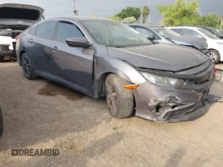 2021 Honda Civic LX z VIN 2HGFC2F64MH555769, wystawiony jako IAAI lot #41954218 z przebiegiem 58 785 mil mil oraz . Historia ofert i sprzedaży dostępna na DreamBid. Obrazek 1.