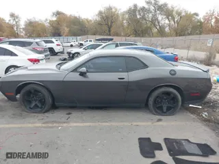 2016 Dodge Challenger SXT with VIN 2C3CDZAG7GH256230, listed as a IAAI auction lot 40884642 with 129,546 mi miles. Bid and sale history available at carsss.com. Image 15.