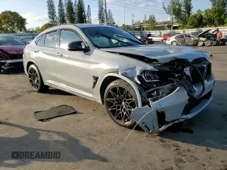 2022 BMW X4 M z VIN 5YM23EC00N9L35827, wystawiony jako Copart lot #87932635 z przebiegiem Nie podano mil oraz Szkoda całkowita • Salvage title. Historia ofert i sprzedaży dostępna na DreamBid. Obrazek 12.