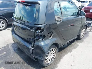 2012 Smart fortwo Pure z VIN WMEEJ3BA1CK556029, wystawiony jako IAAI lot #42173735 z przebiegiem 85 133 mil mil oraz . Historia ofert i sprzedaży dostępna na DreamBid. Obrazek 4.