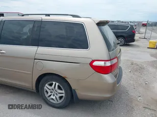 2005 Honda Odyssey EX with VIN 5FNRL38475B029026, listed as a IAAI auction lot 42489079 with 156,075 mi miles and . Bid and sale history available at DreamBid. Image 14.