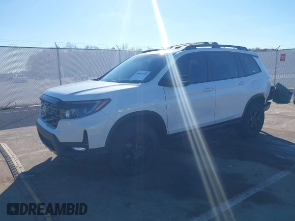 2023 Honda Passport TrailSport z VIN 5FNYF8H68PB007654, wystawiony jako IAAI lot #40816118 z przebiegiem 35 656 mil mil oraz . Historia ofert i sprzedaży dostępna na DreamBid. Obrazek 19.