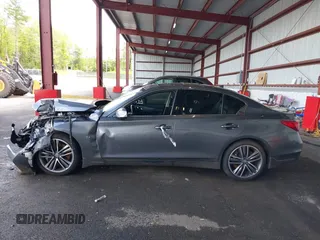 2015 Infiniti Q50 Premium z VIN JN1BV7AR3FM422042, wystawiony jako IAAI lot #42258784 z przebiegiem 72 030 mil mil oraz . Historia ofert i sprzedaży dostępna na DreamBid. Obrazek 14.