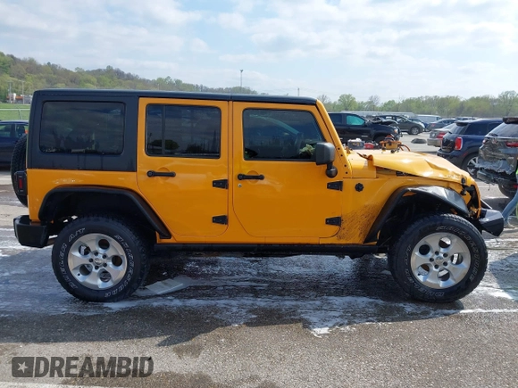 2013 Jeep Wrangler Unlimited Sport z VIN 1C4BJWDG6DL544197, wystawiony jako IAAI lot #41968556 z przebiegiem 121 101 mil mil oraz . Historia ofert i sprzedaży dostępna na DreamBid. Obrazek 14.