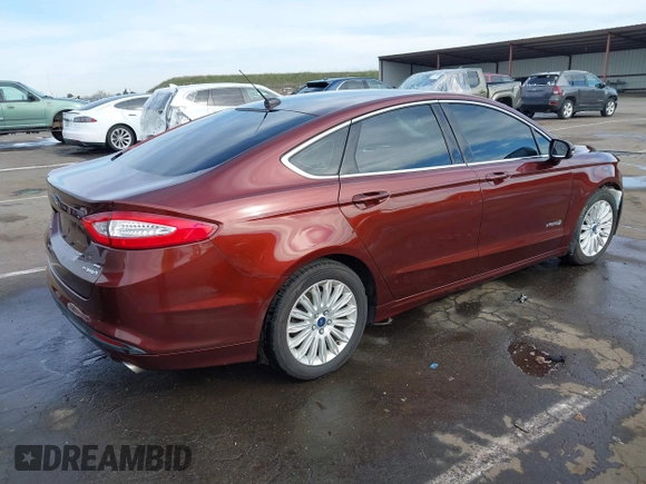 2015 Ford Fusion SE Hybrid with VIN 3FA6P0LU8FR172313, listed as a IAAI auction lot 41556556 with 152,567 mi miles. Bid and sale history available at carsss.com. Image 4.