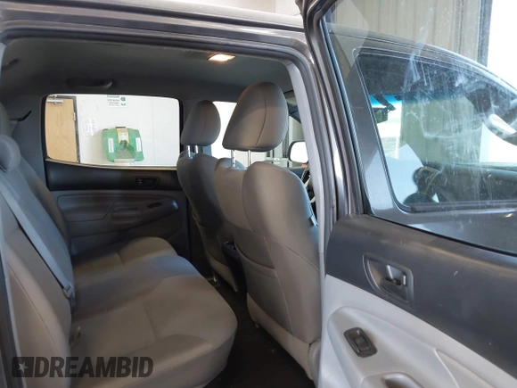 2013 Toyota Tacoma with VIN 3TMLU4EN7DM121253, listed as a IAAI auction lot 42498187 with 145,604 mi miles and . Bid and sale history available at DreamBid. Image 8.