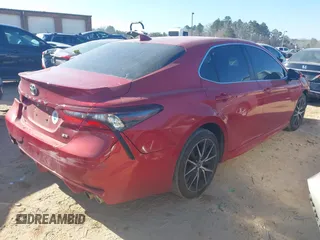 2023 Toyota Camry SE with VIN 4T1G11AK9PU157316, listed as a IAAI auction lot 41595697 with 60,233 mi miles and . Bid and sale history available at DreamBid. Image 4.