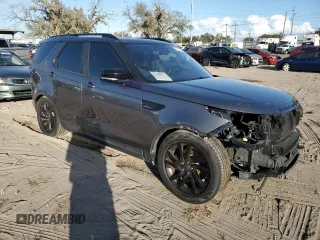 2018 Land Rover Discovery with VIN SALRG2RK3JA050818, listed as a Copart auction lot 77161734 with 86,341 mi miles and Salvage Title. Bid and sale history available at DreamBid. Image 4.