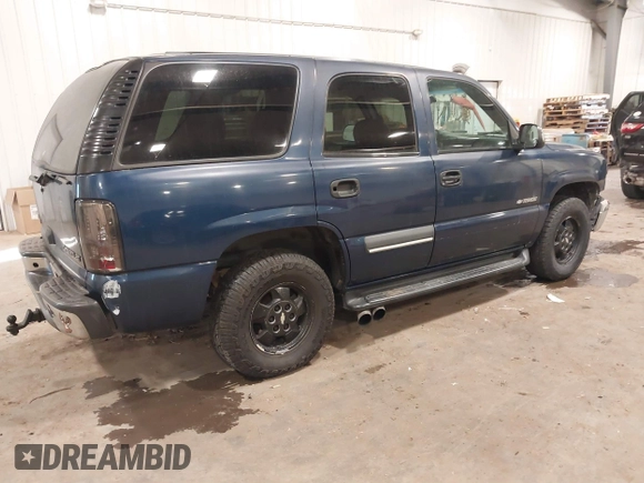 2002 Chevrolet Tahoe LS with VIN 1GNEC13V32R141872, listed as a IAAI auction lot 40994532 with 207,626 mi miles. Bid and sale history available at carsss.com. Image 4.
