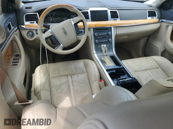 2010 Lincoln MKS with VIN 1LNHL9DR5AG615350, listed as a Copart auction lot 53048495 with 217,863 mi miles and Salvage Title. Bid and sale history available at DreamBid. Image 8.