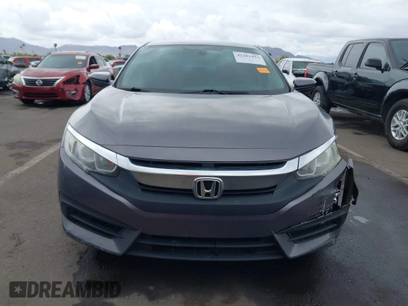 2017 Honda Civic LX with VIN 19XFC2F50HE055888, listed as a IAAI auction lot 42202494 with 147,354 mi miles and . Bid and sale history available at DreamBid. Image 12.