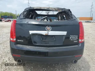 2015 Cadillac SRX Luxury Collection z VIN 3GYFNBE31FS612780, wystawiony jako Copart lot #56149815 z przebiegiem Nie podano mil oraz Nie do naprawy • Non repairable. Historia ofert i sprzedaży dostępna na DreamBid. Obrazek 6.