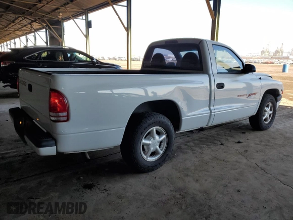 1999 Dodge Dakota SLT with VIN 1B7FL26X6XS180827, listed as a Copart auction lot 85789944 with 85,166 mi miles and Salvage Title. Bid and sale history available at carsss.com. Image 3.