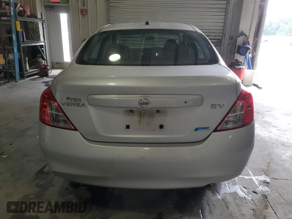 2012 Nissan Versa SV with VIN 3N1CN7AP3CL898221, listed as a Copart auction lot 56211865 with 90,452 mi miles and Salvage title. Bid and sale history available at DreamBid. Image 6.