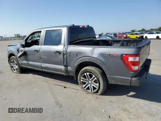 2023 Ford F-150 XL with VIN 1FTEW1CP4PKD21685, listed as a Copart auction lot 54992615 with 27,252 mi miles and Salvage title. Bid and sale history available at DreamBid. Image 2.