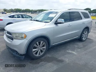 2011 Dodge Durango Crew with VIN 1D4RD4GGXBC598205, listed as a IAAI auction lot 41908965 with 182,875 mi miles and . Bid and sale history available at carsss.com. Image 2.