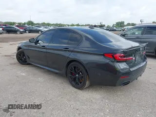2021 BMW 5 Series 540i with VIN WBA53BJ03MCG98664, listed as a IAAI auction lot 42488708 with 64,101 mi miles and . Bid and sale history available at DreamBid. Image 3.