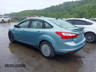 2012 Ford Focus SE with VIN 1FAHP3F21CL226033, listed as a IAAI auction lot 42368786 with 168,061 mi miles and . Bid and sale history available at DreamBid. Image 3.
