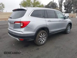 2019 Honda Pilot EX-L with VIN 5FNYF6H54KB055687, listed as a IAAI auction lot 42050539 with 50,989 mi miles and . Bid and sale history available at carsss.com. Image 4.