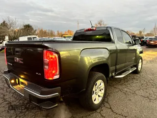 2015 GMC Canyon 2WD SLE with VIN 1GTH5BEA3F1138233, listed as a Copart auction lot 83715314 with 71,254 mi miles and Clean Title. Bid and sale history available at carsss.com. Image 4.