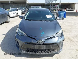 2019 Toyota Corolla L with VIN 5YFBURHE9KP910059, listed as a IAAI auction lot 41856905 with 104,096 mi miles and . Bid and sale history available at DreamBid. Image 12.