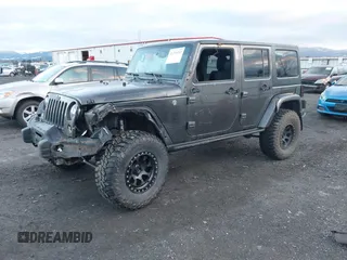 2017 Jeep Wrangler Unlimited Sahara with VIN 1C4BJWEG8HL638067, listed as a IAAI auction lot 41274352 with 57,339 mi miles. Bid and sale history available at carsss.com. Image 17.