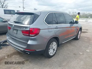 2016 BMW X5 xDrive35i z VIN 5UXKR0C53G0P19015, wystawiony jako IAAI lot #41930862 z przebiegiem 150 762 mil mil oraz . Historia ofert i sprzedaży dostępna na DreamBid. Obrazek 4.