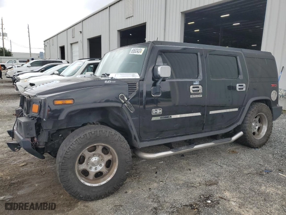 2003 Hummer H2 with VIN 5GRGN23UX3H121939, listed as a Copart auction lot 69503424 with 170,144 mi miles and Salvage Title. Bid and sale history available at carsss.com. Image 1.