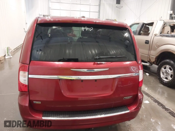 2015 Chrysler Town & Country Touring with VIN 2C4RC1BG2FR595107, listed as a IAAI auction lot 42008257 with 149,527 mi miles and . Bid and sale history available at DreamBid. Image 16.