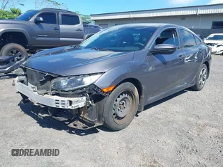 2020 Honda Civic LX z VIN 19XFC2F67LE001375, wystawiony jako IAAI lot #42033879 z przebiegiem 79 941 mil mil oraz . Historia ofert i sprzedaży dostępna na DreamBid. Obrazek 18.