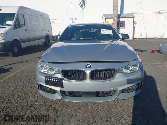 2015 BMW 4 Series 428i with VIN WBA4A5C58FG051293, listed as a IAAI auction lot 41255541 with 60,737 mi miles and . Bid and sale history available at DreamBid. Image 13.