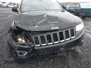 2015 Jeep Grand Cherokee Laredo with VIN 1C4RJFAGXFC602544, listed as a IAAI auction lot 41504666 with 190,170 mi miles. Bid and sale history available at carsss.com. Image 6.