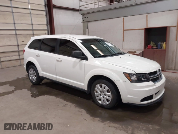 2015 Dodge Journey American Value z VIN 3C4PDCAB4FT714200, wystawiony jako IAAI lot #42199910 z przebiegiem 205 009 mil mil oraz . Historia ofert i sprzedaży dostępna na DreamBid. Obrazek 1.