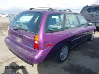 1997 Ford Escort LX with VIN 3FALP15P9VR137438, listed as a IAAI auction lot 41872987 with 134,606 mi miles. Bid and sale history available at carsss.com. Image 4.