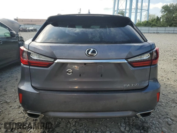 2016 Lexus RX 350 z VIN 2T2BZMCA7GC003824, wystawiony jako Copart lot #61991015 z przebiegiem 113 583 mil mil oraz Szkoda całkowita • Salvage title. Historia ofert i sprzedaży dostępna na DreamBid. Obrazek 6.