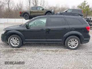 2014 Dodge Journey SXT with VIN 3C4PDCBG1ET142687, listed as a IAAI auction lot 41698232 with 170,521 mi miles. Bid and sale history available at carsss.com. Image 13.
