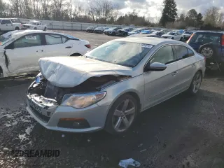2012 Volkswagen CC Lux with VIN WVWHN7AN0CE509696, listed as a Copart auction lot 87064974 with 133,261 mi miles and Salvage Title. Bid and sale history available at carsss.com. Image 1.