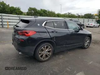 2018 BMW X2 sDrive28i with VIN WBXYJ3C34JEJ91176, listed as a Copart auction lot 63418365 with 62,586 mi miles and Salvage title. Bid and sale history available at DreamBid. Image 3.