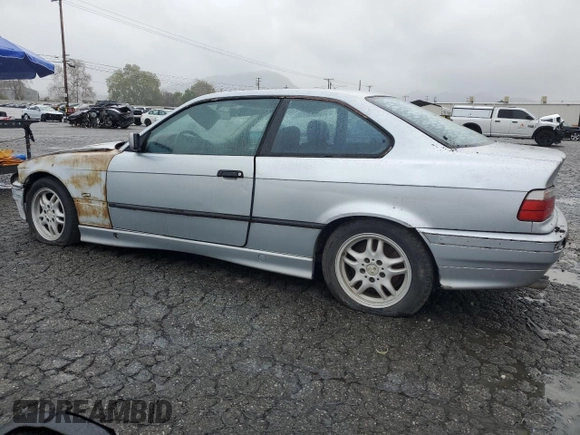 1998 BMW 3 Series 328is with VIN WBABG132XWET07045, listed as a Copart auction lot 49470225 with 186,922 mi miles and Clean Title. Bid and sale history available at carsss.com. Image 2.