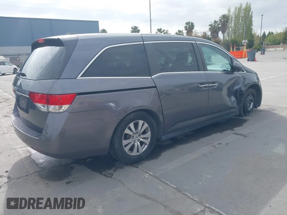 2016 Honda Odyssey EX-L with VIN 5FNRL5H68GB104350, listed as a IAAI auction lot 42023306 with 124,672 mi miles. Bid and sale history available at carsss.com. Image 4.