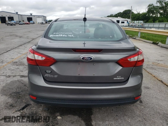2013 Ford Focus SE with VIN 1FADP3F29DL207679, listed as a Copart auction lot 58322625 with 142,610 mi miles and Salvage title. Bid and sale history available at DreamBid. Image 6.